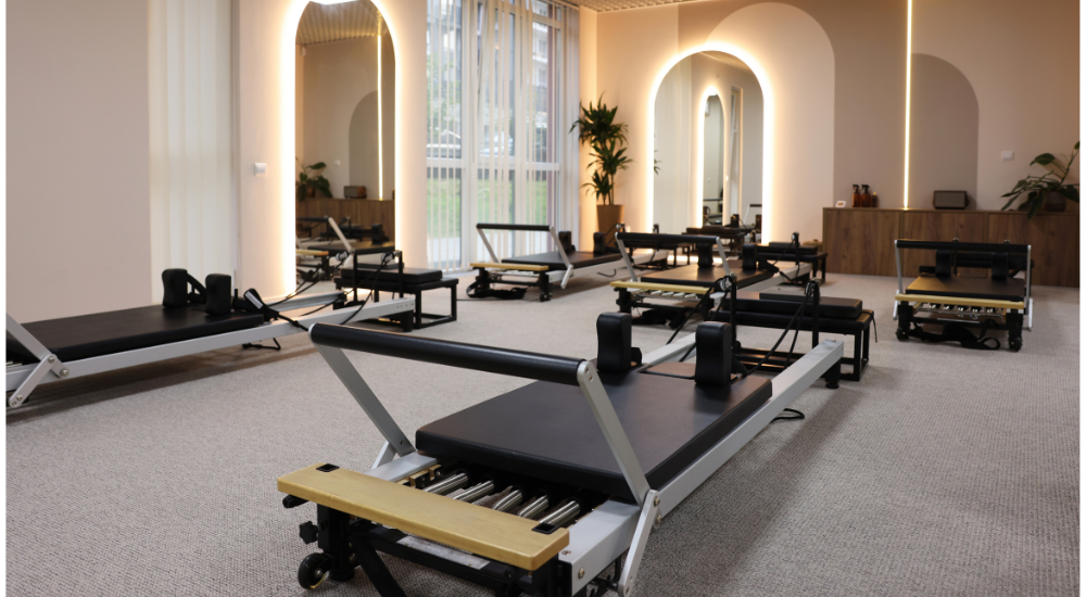 Pilates reformer studio with premium flooring