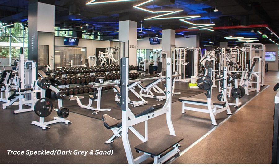 Superstrata Trace speckled dark grey and sand installed in a commercial gym